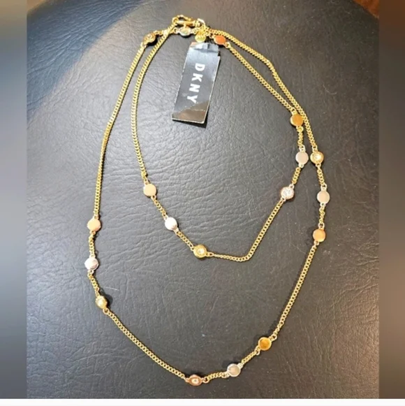 DKNY Tri Tone Crystal & Logo Disc 42" Statement Necklace - Picture 8 of 10